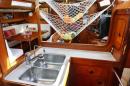 Solar Planet 51 Beneteau Idylle 15,5: Galley with double sink starboardside. View to bow